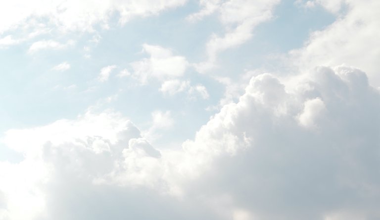 white clouds on blue sky